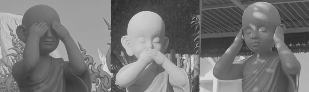 Tres niños monje del Templo Blanco: boca, ojos y oídos cubiertos